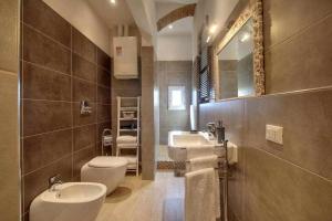 Kúpeľňa v ubytovaní San marco elegant apartment + 15 fotografií