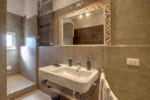 A bathroom at San marco elegant apartment