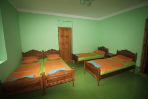 Hotel Nodmax房間的床