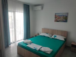 Кровать или кровати в номере Vila La Fernando