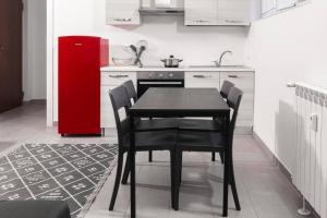 Η κουζίνα ή μικρή κουζίνα στο Staurenghi Green Apartment +4 φωτογραφίες