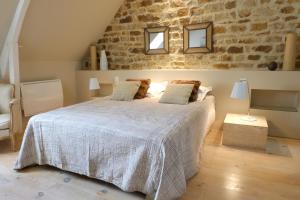 Postel nebo postele na pokoji v ubytování Manoir de la Prise Tarot + 33 fotografií