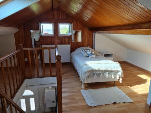 Posteľ alebo postele v izbe v ubytovaní La Maison des 4 moineaux