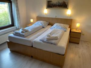 Postel nebo postele na pokoji v ubytování Hotel PB