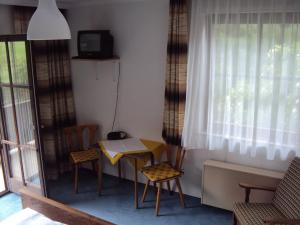 Televizors / izklaižu centrs naktsmītnē Hotel-Garni Kaiserhof