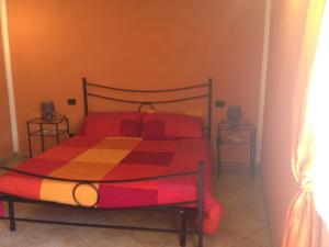 Postel nebo postele na pokoji v ubytování Agriturismo il Tiglio