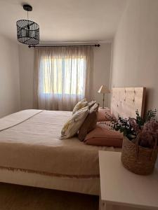 Posteľ alebo postele v izbe v ubytovaní NUEVO Apartamento en Jávea