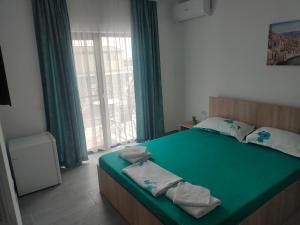 Кровать или кровати в номере Vila La Fernando