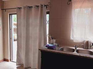 Et badeværelse på Kuntuala House + 67 billeder