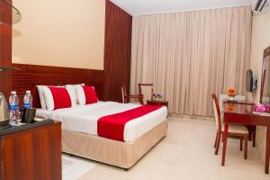 Postel nebo postele na pokoji v ubytování Al Jabal Hotel