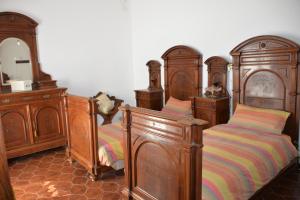A bed or beds in a room at Villa Magnolia