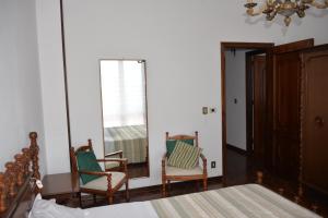 A bed or beds in a room at Villa Magnolia