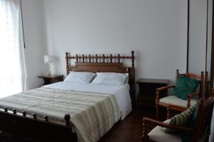 A bed or beds in a room at Villa Magnolia