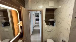 Koupelna v ubytování Top Design Apartment