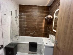 Koupelna v ubytování Top Design Apartment