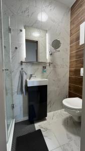 Koupelna v ubytování Top Design Apartment