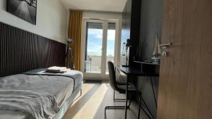 Postel nebo postele na pokoji v ubytování Top Design Apartment