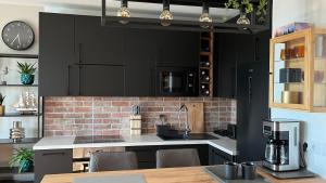 Kuchyň nebo kuchyňský kout v ubytování Top Design Apartment