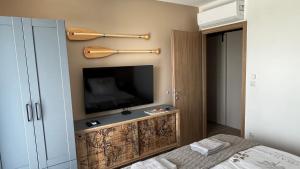 TV a/nebo společenská místnost v ubytování Top Design Apartment