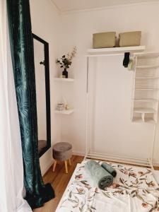 Postel nebo postele na pokoji v ubytování Apartment Melani