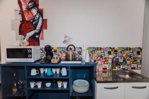 A kitchen or kitchenette at Mole Adriana Guest House