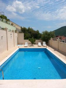 a swimming pool on top of a building at Villa Natalia in Neum