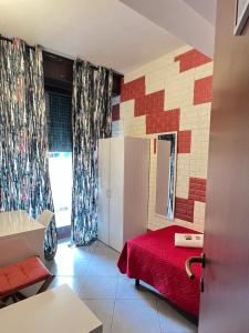 Postel nebo postele na pokoji v ubytování Guest House Brianza Room
