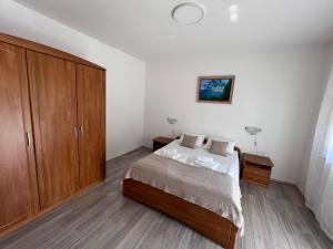 מיטה או מיטות בחדר ב-Apartments Iskra