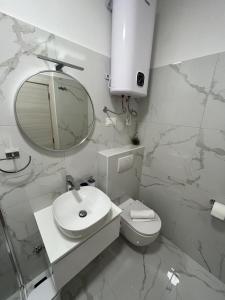 Vonios kambarys apgyvendinimo įstaigoje Apartments Iskra