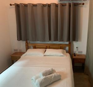 Postel nebo postele na pokoji v ubytování Cella Villa