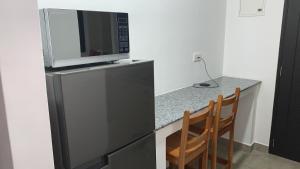Kuchyň nebo kuchyňský kout v ubytování Cella Villa