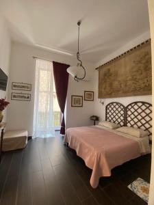 Posteľ alebo postele v izbe v ubytovaní A Casa di Claudia