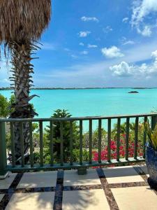 a view of the ocean from a resort balcony at Turquoise Haven Villa in Providenciales