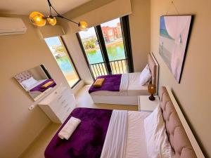 Giường trong phòng chung tại Luxury 3 bedrooms town house