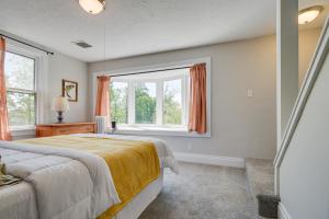 1 dormitorio con cama y ventana en Grantville Home Rental with Game Room on 5 Acres!, en Grantville