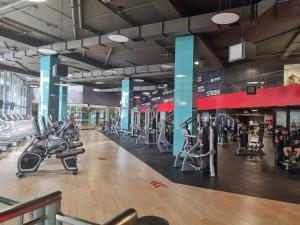 a gym with lots of treadmills and machines at Antofagasta de Lujo in Antofagasta
