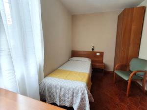 Postel nebo postele na pokoji v ubytování Altavilla Albergo meublé