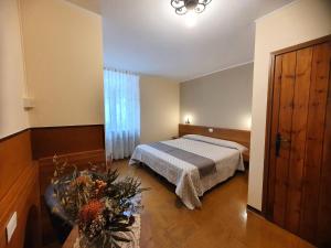 Postel nebo postele na pokoji v ubytování Altavilla Albergo meublé