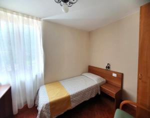 Postel nebo postele na pokoji v ubytování Altavilla Albergo meublé