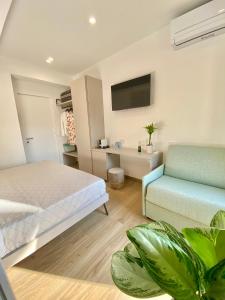 Μια τηλεόραση ή/και κέντρο ψυχαγωγίας στο Casa Degli Dei Tropea -Luxury Rooms-