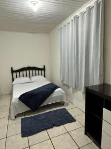 Кровать или кровати в номере Casa Recanto Alegria