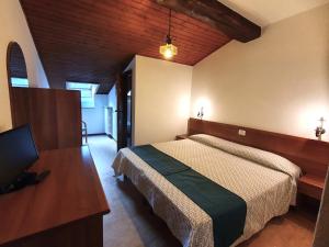 Postel nebo postele na pokoji v ubytování Altavilla Albergo meublé