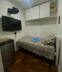 Voodi või voodid majutusasutuse Apartamento Raiz de Copacabana toas