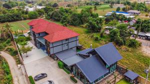 an overhead view of a house with red roofs at New Skyway 