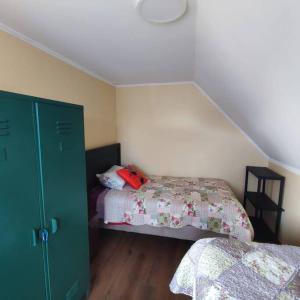 Ein Bett oder Betten in einem Zimmer der Unterkunft Acogedor departamento interior con acceso independiente y estacionamiento