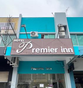 a store front with a sign that reads premier inn at Hotel Premier Inn (Prima Square) in Sandakan
