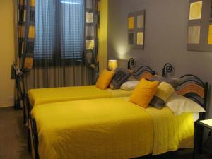A bed or beds in a room at B&B Domu Mea