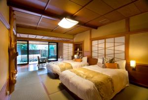 Postel nebo postele na pokoji v ubytování ABBA Resorts Izu - Zagyosoh + 37 fotografií