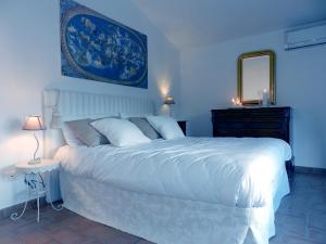Postel nebo postele na pokoji v ubytování Agriturismo Gli Archi