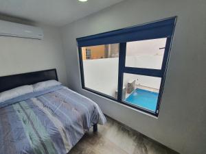 Postel nebo postele na pokoji v ubytování FIESTA MIRAMAR